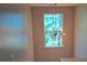 Hallway with a decorative light fixture and a window with a view at 133 Pelican Lane, Summerville, SC 29485