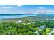 Stunning aerial view showcasing waterfront homes between West Ashley and James Island at 1343 Headquarters Plantation Dr, Johns Island, SC 29455