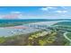 Aerial view of Charleston with a marina, golf course, and water views at 1343 Headquarters Plantation Dr, Johns Island, SC 29455