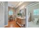 Bathroom with a wood vanity, white countertop, mirror, and recessed lights at 1343 Headquarters Plantation Dr, Johns Island, SC 29455