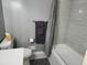Well-appointed bathroom featuring a shower with gray accents and updated fixtures at 1389 Parkshore Dr, Charleston, SC 29407