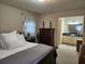 Bedroom leads to bathroom with a sink and tiled shower at 1389 Parkshore Dr, Charleston, SC 29407