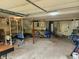 Spacious garage features ample storage space, work-out area, and access to home systems at 1389 Parkshore Dr, Charleston, SC 29407