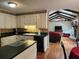 Charming kitchen seamlessly connects to a cozy living area with a fireplace at 1389 Parkshore Dr, Charleston, SC 29407