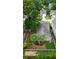 Aerial view of property featuring well-maintained landscaping, privacy fence and a home's roof at 1460 Oldenburg Dr, Mount Pleasant, SC 29429