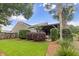 Spacious backyard with mature landscaping, privacy fence and a cozy outdoor living area at 1460 Oldenburg Dr, Mount Pleasant, SC 29429