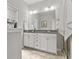 Bathroom featuring a double sink vanity, granite countertops, and modern lighting at 1460 Oldenburg Dr, Mount Pleasant, SC 29429