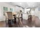 Bright kitchen and dining area with white cabinetry, stainless appliances, and hardwood flooring at 1460 Oldenburg Dr, Mount Pleasant, SC 29429