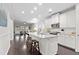 Bright, open kitchen features a large island, white cabinetry, and stainless-steel appliances at 1460 Oldenburg Dr, Mount Pleasant, SC 29429