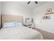 Serene bedroom featuring a comfortable bed, a sleek vanity, and soft natural light at 1582 Prince Edward St, Mount Pleasant, SC 29466