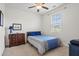 Bright bedroom featuring a ceiling fan, and a large window providing ample natural light at 1582 Prince Edward St, Mount Pleasant, SC 29466