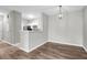 Dining area features modern pendant lighting and an adjacent breakfast bar overlooking the kitchen at 1600 Long Grove Dr # 423, Mount Pleasant, SC 29464