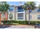 Charming condo featuring dual screened-in balconies, private parking, and mature landscaping at 1600 Long Grove Dr # 423, Mount Pleasant, SC 29464