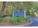 Long Grove community sign surrounded by lush landscaping and mature trees at 1600 Long Grove Dr # 423, Mount Pleasant, SC 29464