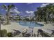 Community pool featuring zero entry, lounge seating, and beautiful landscaping, a perfect area for community fun at 1619 Cultivation Ln, Mount Pleasant, SC 29466