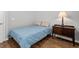 Small, neat bedroom with a comfortable bed, natural light from the window, and simple decor at 1666 Sparkleberry Ln, Johns Island, SC 29455