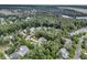 Lush, green treetops hide a quiet neighborhood in this attractive aerial image at 1728 Wellstead St, Mount Pleasant, SC 29466