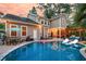 Stunning backyard pool and patio offer a perfect setting for outdoor enjoyment and relaxation at 1728 Wellstead St, Mount Pleasant, SC 29466