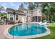 Expansive backyard with in-ground pool, patio, and outdoor kitchen, perfect for entertaining at 1728 Wellstead St, Mount Pleasant, SC 29466