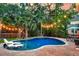 Inviting backyard pool with lounge chairs and lush greenery at 1728 Wellstead St, Mount Pleasant, SC 29466