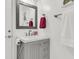 Bathroom featuring a gray vanity with decorative mirror, clean finishes, and fixtures at 1728 Wellstead St, Mount Pleasant, SC 29466