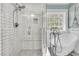 Bathroom with a glass-enclosed shower, soaking tub, and modern fixtures, offering a spa-like experience at 1728 Wellstead St, Mount Pleasant, SC 29466
