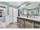 Bathroom featuring a modern vanity with dual sinks and a large mirror, offering ample counter space at 1728 Wellstead St, Mount Pleasant, SC 29466