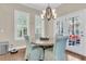 Cozy breakfast nook with hardwood floors and a view of the outdoor patio at 1728 Wellstead St, Mount Pleasant, SC 29466