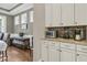 Butler Pantry featuring light granite countertops and white cabinets at 1728 Wellstead St, Mount Pleasant, SC 29466