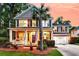 Beautiful two-story home with a cozy front porch and well-maintained lawn at 1728 Wellstead St, Mount Pleasant, SC 29466