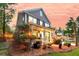 Charming two-story home featuring a welcoming front porch and manicured landscaping at 1728 Wellstead St, Mount Pleasant, SC 29466