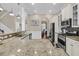 Large kitchen with white cabinets, granite countertops and stainless appliances at 1728 Wellstead St, Mount Pleasant, SC 29466