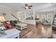 Open concept living room with eat-in kitchen with granite countertops and dining area at 1728 Wellstead St, Mount Pleasant, SC 29466