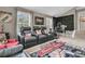 Relaxing entertainment room featuring comfortable seating, a big-screen TV, and musical instruments for a versatile space at 1728 Wellstead St, Mount Pleasant, SC 29466