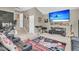 Entertainment room with a large TV, comfortable seating, and music-related decor provides a space for relaxation and recreation at 1728 Wellstead St, Mount Pleasant, SC 29466