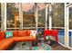 Comfortable screened porch with stylish seating and views of the backyard at 1728 Wellstead St, Mount Pleasant, SC 29466