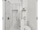 Bathroom featuring a walk-in shower and seashell decor at 1728 Wellstead St, Mount Pleasant, SC 29466