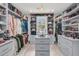 Spacious walk-in closet with custom shelving and drawers, providing ample storage for clothing and accessories at 1728 Wellstead St, Mount Pleasant, SC 29466