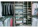 Well-organized walk-in closet features hanging space for suits and shirts, with shelving for shoes and folded clothes at 1728 Wellstead St, Mount Pleasant, SC 29466