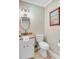 Well-appointed half bathroom with vanity, updated fixtures and lighting at 196 Dogwood Ridge Rd, Summerville, SC 29485