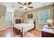 Bright bedroom with wood floors, a ceiling fan and natural light from the windows at 196 Dogwood Ridge Rd, Summerville, SC 29485