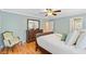 Comfortable bedroom featuring a ceiling fan, wood floors, and traditional furnishings at 196 Dogwood Ridge Rd, Summerville, SC 29485