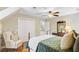 Bedroom with a four-poster bed, ceiling fan, closet, chair and natural light at 196 Dogwood Ridge Rd, Summerville, SC 29485
