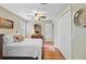 Bedroom featuring wood floors, ceiling fan, closet and natural light from the windows at 196 Dogwood Ridge Rd, Summerville, SC 29485