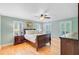 Bedroom featuring a ceiling fan, hardwood floors, neutral walls, and white plantation shutters at 196 Dogwood Ridge Rd, Summerville, SC 29485