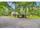 Charming two-story home featuring a well-manicured lawn and a circular driveway at 196 Dogwood Ridge Rd, Summerville, SC 29485