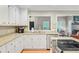 Well-appointed kitchen featuring white cabinetry, stainless steel appliances, and beautiful granite countertops at 196 Dogwood Ridge Rd, Summerville, SC 29485
