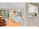 Bright and airy kitchen with stainless appliances, granite countertops, and a pass-through to the dining area at 196 Dogwood Ridge Rd, Summerville, SC 29485