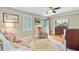 Cozy living room featuring hardwood floors, stylish furniture, a ceiling fan, and a view of the backyard at 196 Dogwood Ridge Rd, Summerville, SC 29485