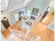 Open living room with high ceilings, fireplace, wood floors, and plenty of natural light at 196 Dogwood Ridge Rd, Summerville, SC 29485